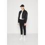 TRACKPANTS CROPPED - Tracksuit bottoms - black