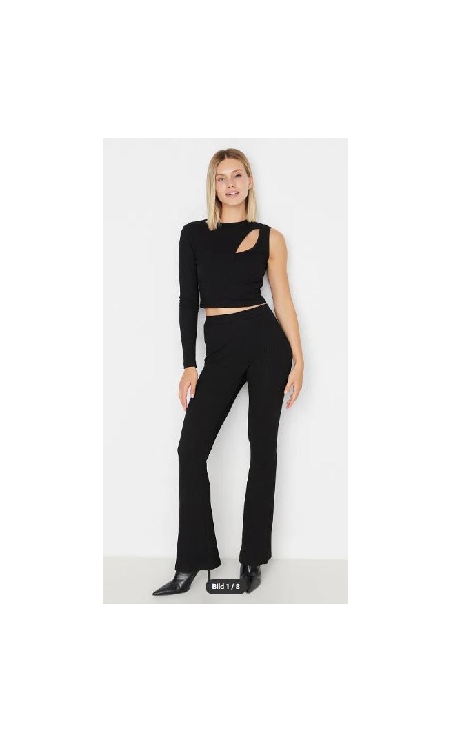 Black top and bottom set with cut-outs, ribbed knit and flexible single sleeve